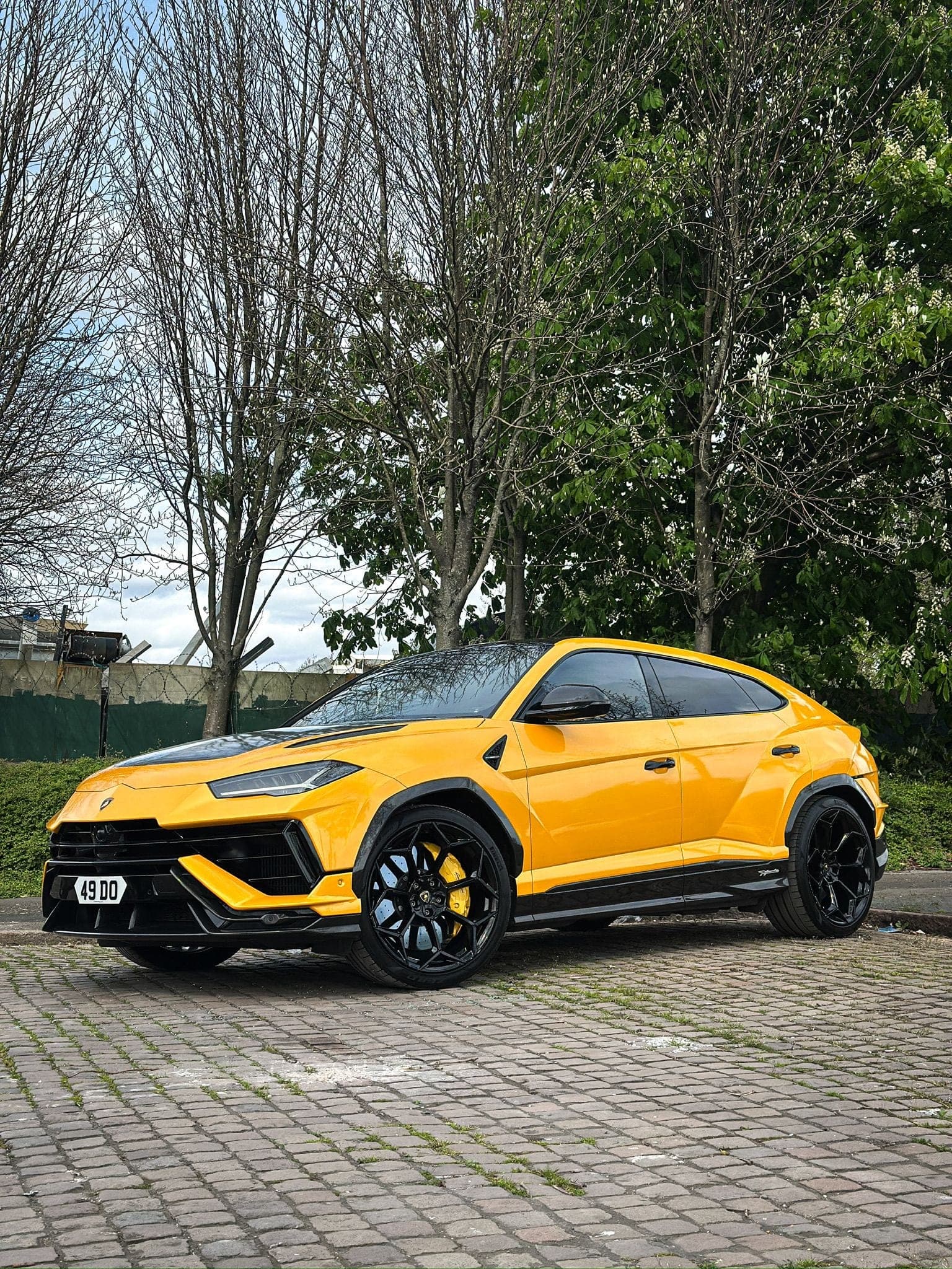 Giallo Inti yellow Lamborghini Urus Performante for luxury SUV hire at CVS Car Hire Birmingham